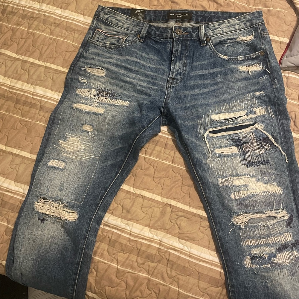 cult of individuality, dark blue jean look, loose around the ankle, never worn!